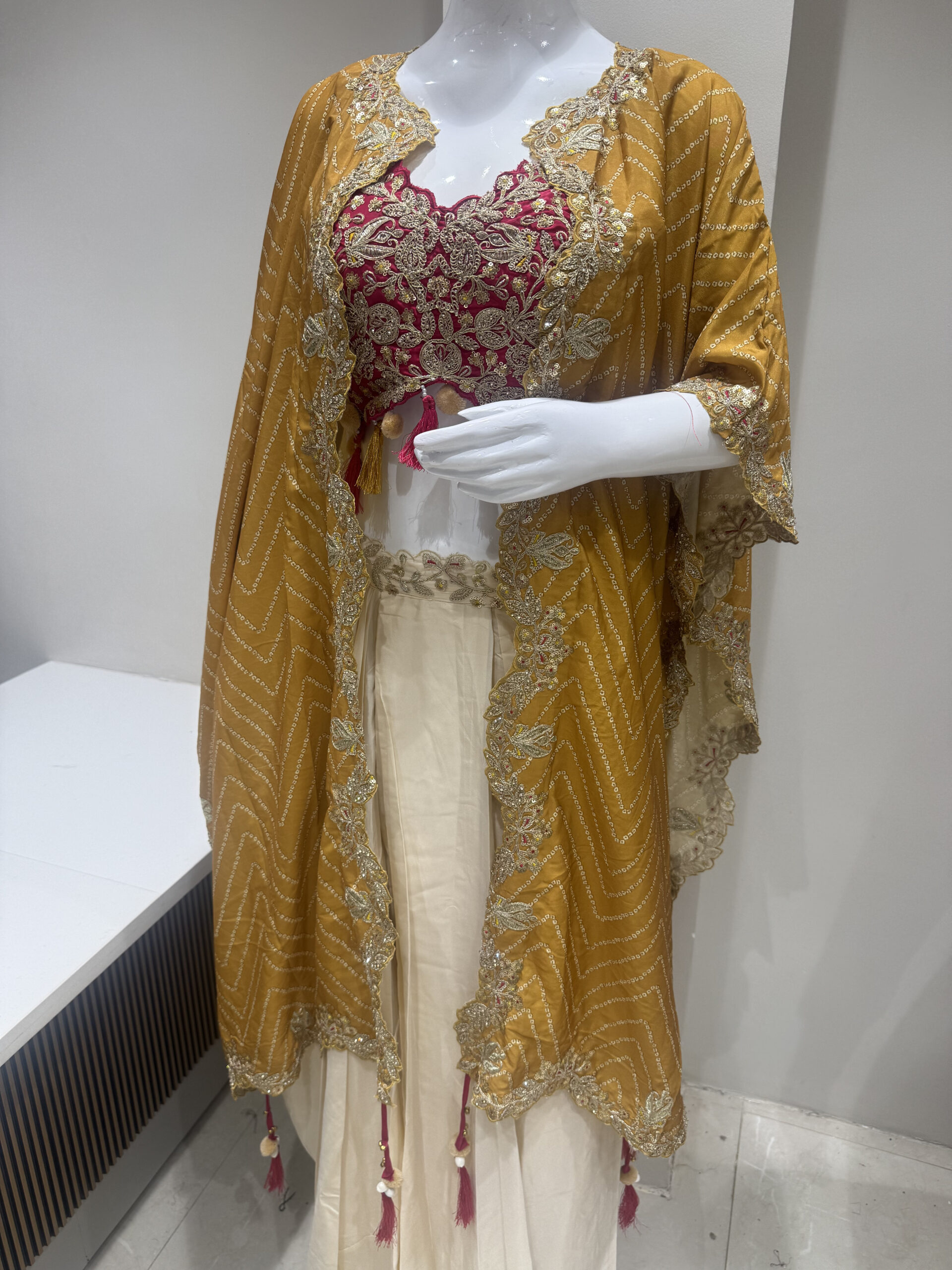 Mustard Yellow Designer Embroidered Cape with Magenta Blouse & Cream Lehenga Set